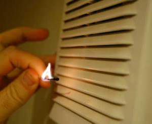 Checking ventilation with a lit match