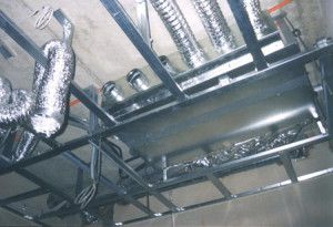 the equipment lies on a suspended metal structure
